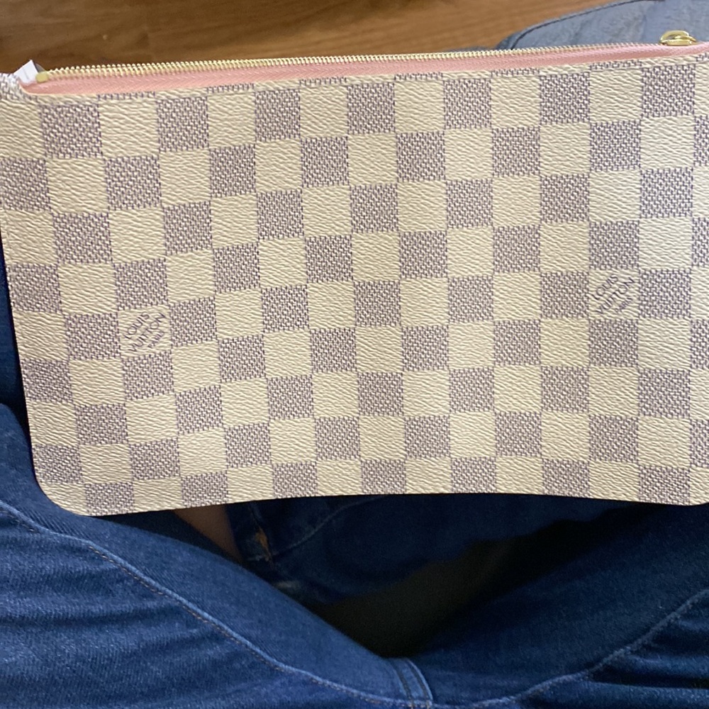 neverfull mm pouch new never used